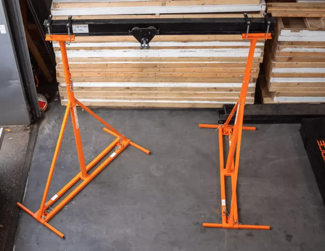 A black and orange steel rotational gantry made by Shearforce demonstrating why they are a smart investment for industry use.